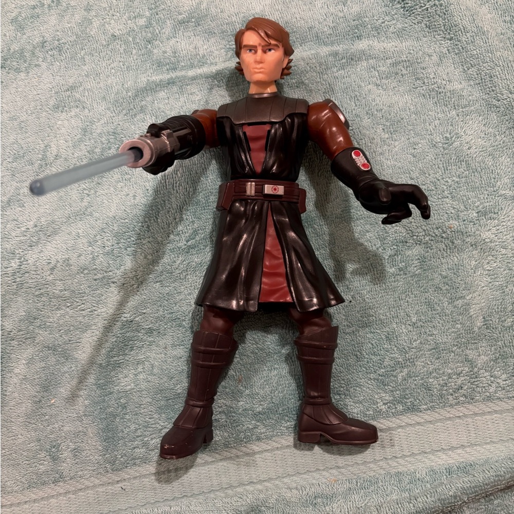 Star Wars Anakin Skywalker action figure with light up lightsaber